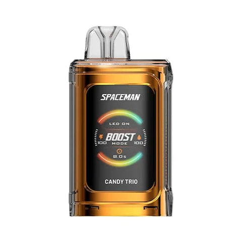 A front view of the golden Candy Trio flavored Spaceman Vape PRISM 20k device with 1000mAh battery, 1.77" color screen, 18ml tank capacity and ergonomic design featuring adjustable airflow.