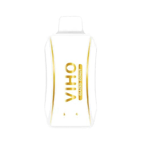 Slim white VIHO Turbo vape with metallic yellow logo displayed on table, featuring ergonomic grip and integrated battery for savoring glazed donut flavor.