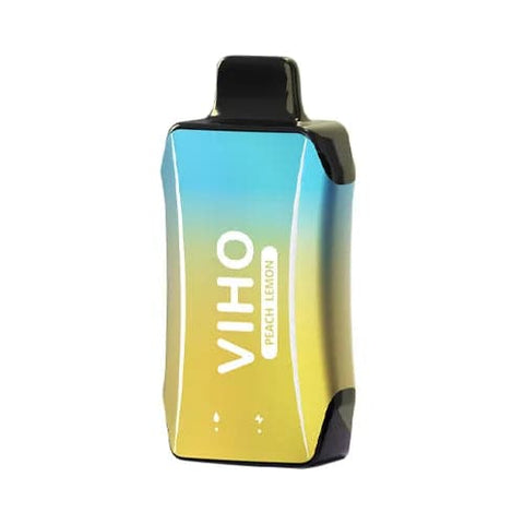 Sleek and modern two-tone yellow and cyan VIHO Turbo vape with ergonomic design sits on table, featuring rechargeable battery and easy-grip shape for flavorful peach lemon vaping.